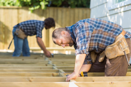 deck contractors working on deck outdoors